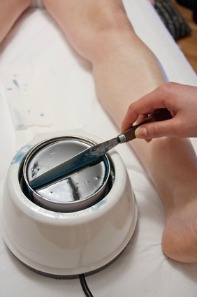 waxing hair removal on legs for temporary body hair removal